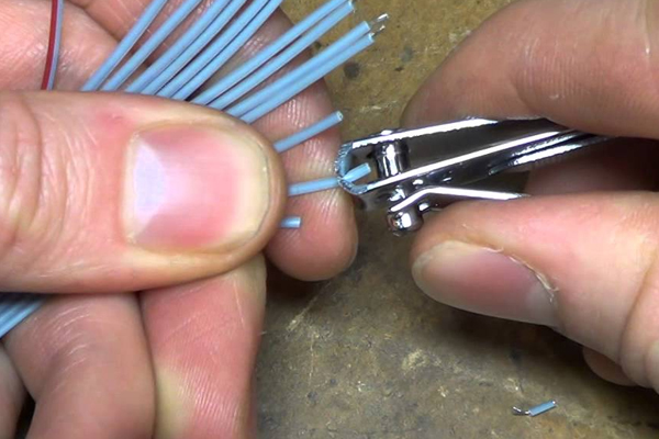 strip wire with nail clippers